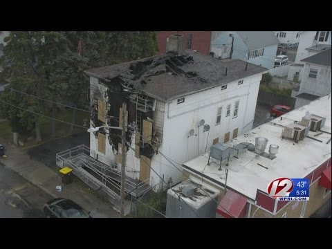 Firefighter hurt battling flames at Fall River triple-decker